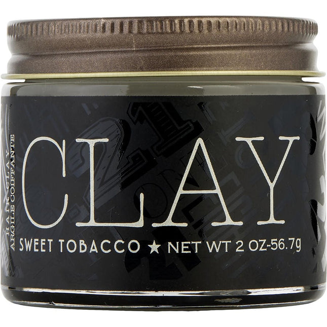 18.21 Man Made Hair Clay Sweet Tobacco 2 oz
